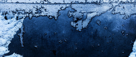 Winter Frosty Blue Patterns on the Glass