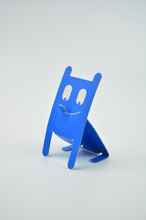 Blue cat on white background. Interesting funny cat from paperの写真素材