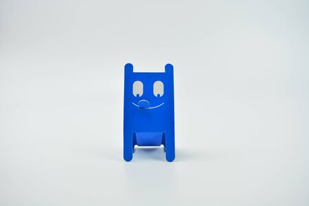 Blue cat on white background. Interesting funny cat from paperの写真素材