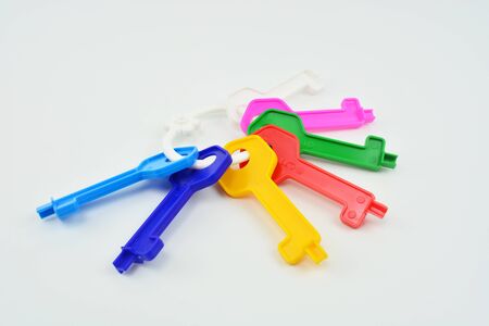 Plastic color keys on white background. Collection of plastic keys. Color keysの写真素材