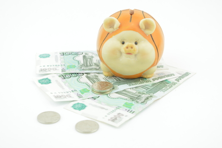Russian ruble one thousand and coins. The time is money. I'ts time to collect your money. Russian money, banknote. Money box as pig for coins. Put your money in thrift-boxの写真素材