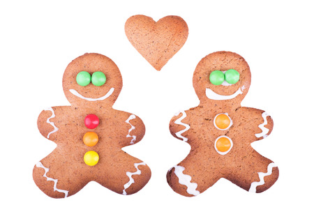 Men and heart of ginger cookies. Isolated on white backgroundの写真素材