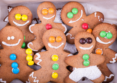 A group of gingerbread men. Colored buttonsの写真素材