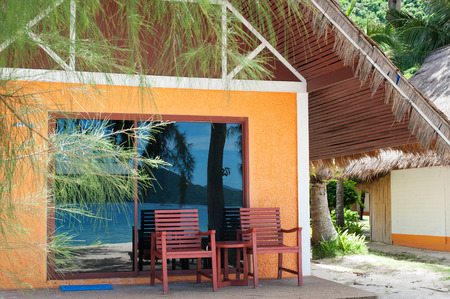 Two chairs at a beach house. Sea viewsの写真素材