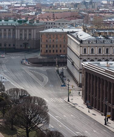 View of the city in early spring. Facades and roofs of buildings, empty street. The historic city centerのeditorial素材