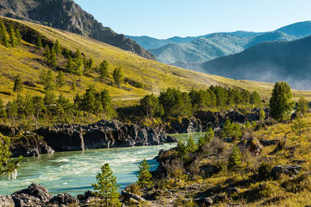 Russia, Altai beautiful mountain landscape. View of the river, mountains and forestの写真素材