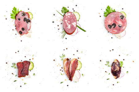 Fresh delicious sausage snacks with vegetables isolated on white background.の写真素材