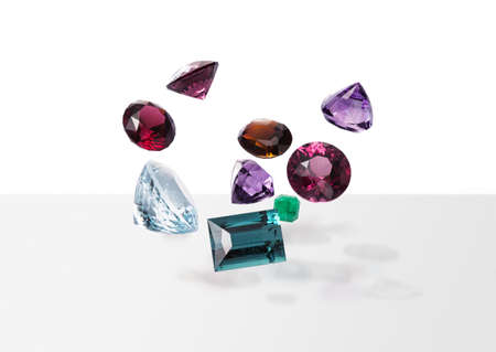 Flying handful of perfect shining gems with shadows. Dazzling luxury jewelry. composition four.の写真素材