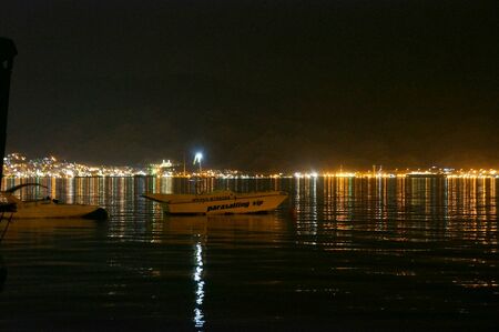 Night view on  gulf of Eilat and Aqaba from Eilat beachのeditorial素材