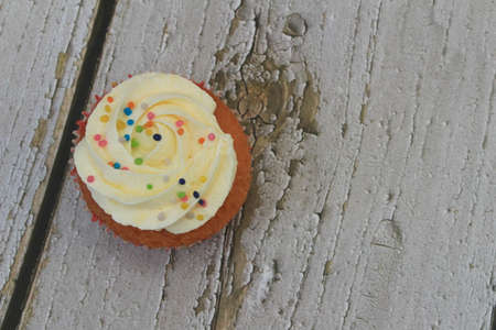Homemade tutti frutti candied fruit sponge cake on table and colorful background for Christmasの写真素材