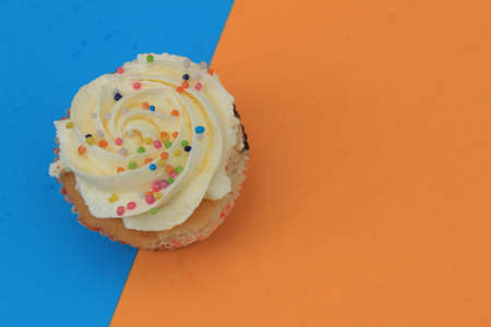 Homemade tutti frutti candied fruit sponge cake on table and colorful background for Christmasの写真素材