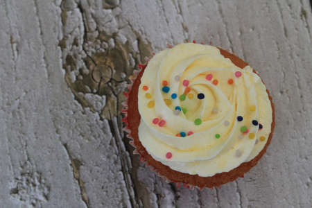 Homemade tutti frutti candied fruit sponge cake on table and colorful background for Christmasの写真素材