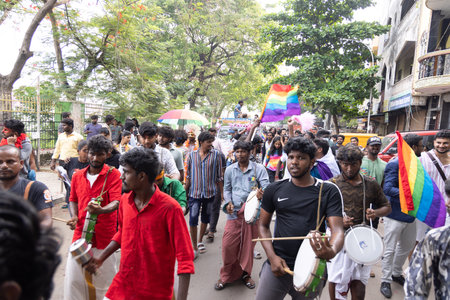 Chennai, Tamilnadu India - June 25 2023 : Rear view of Group of people with pride rainbow flag and banners in the pride parade.のeditorial素材