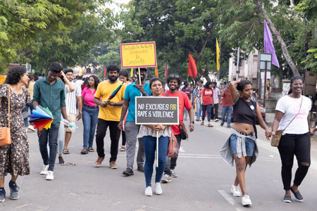 Chennai, Tamilnadu India - June 25 2023 : Rear view of Group of people with pride rainbow flag and banners in the pride parade.のeditorial素材