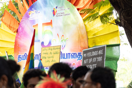 Chennai, Tamilnadu India - June 25 2023 : Rear view of Group of people with pride rainbow flag and...