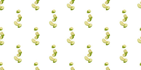 Seamless pattern of green apple slices falling against a white background, ideal for food-related designsの写真素材