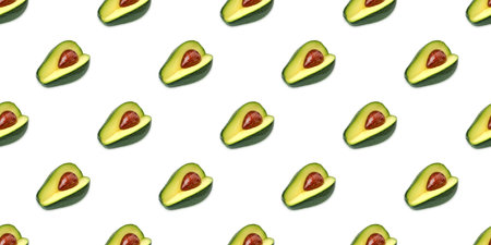 Seamless pattern of fresh cut avocado halves on a white background, showing vibrant green flesh and...