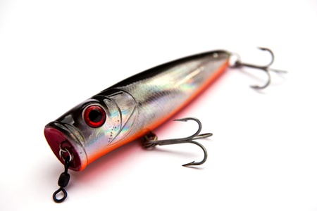 Popper for fishing a predatory fish on whiteの写真素材