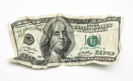 One hundred dollars in the form of the rumpled paperの写真素材