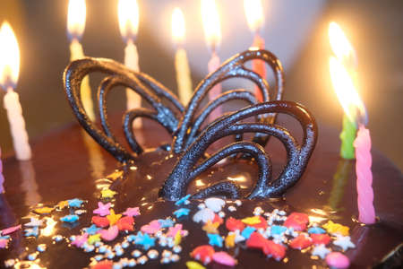 chocolate cake with colorful decoration with chocolate chips and wafersの写真素材