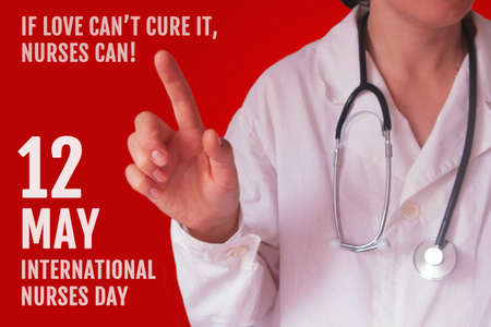 International nurses day. A young  Caucasian nurse in a white coat on a red background, points a finger at the inscription "If love can't cure it,nurses can!"の写真素材