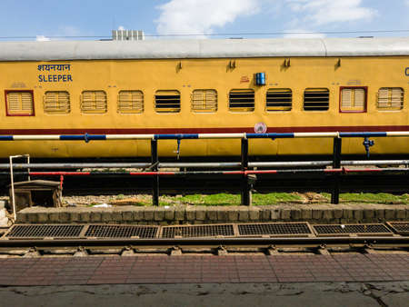 Bangalore, Karnataka, India - January 2020: A train run by the Indian Railways standing on a platform of the Bengaluru Railway station.のeditorial素材