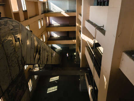 Chennai, Tamil Nadu, India - January 2020: The dark interiors of the Thirvanmiyur railway station on the MRTS line in the city.のeditorial素材