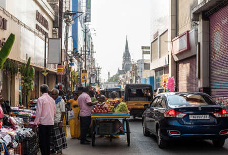 Trichy, Tamil Nadu, India - February 2020: Street vendors and heavy traffic on a crowded market...