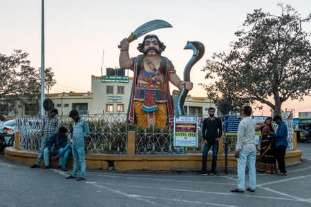 Mysore, Karnataka, India - January 2019: Tourists in front of the statue of the demon Mahishasura in the Chamundi Hills area of the city of Mysuru.のeditorial素材