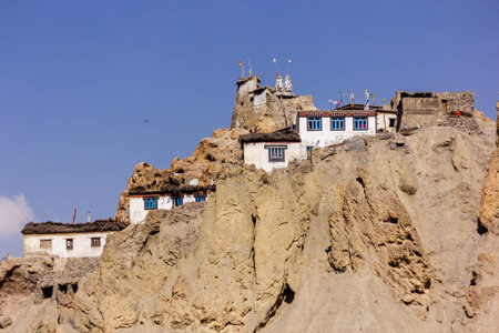 The ancient Buddhist monastery in the village of Dhankar on a barren cliff in the Spiti Valley in Himachal Pradesh, India.の写真素材