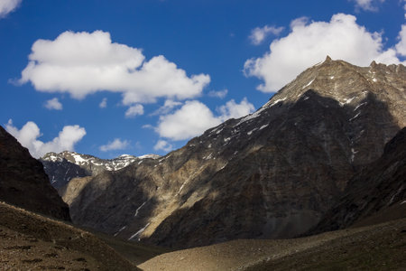 Beautiful Himalayan mountains under a blue sky on the wilderness trek from Manali to Zanskar in Himachal Pradesh, India.の写真素材
