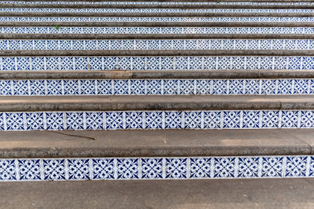 Beautiful detail of vintage mosaic tiles on the stairs leading to Altinho hill in the city of Panjim in Goa.の写真素材
