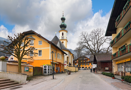 ST. GILGEN - AUSTRIA, FEBRUARY, 25. Village St. Gilgen by the Wolfgangsee with the church of Saint Giles on February 25, 2016 in the austrian state of Salzburg, in the "Salzkammergut" region. Austria.のeditorial素材