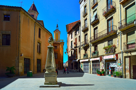 VIC/ SPAIN - MARCH, 27, 2015: Public stone drinking fountain on the square Placa del Pes. Vic, Spain.のeditorial素材