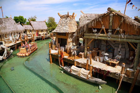 PORT AVENTURA, SPAIN - MAY 11, 2015. Interactive water attraction Angkor - an imitation of a Cambodian fishing village. Theme Park Port Aventura, Salou, Spainのeditorial素材