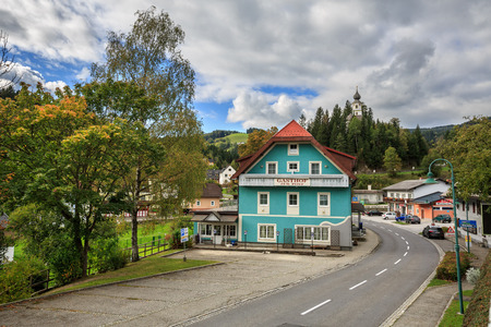 ST.KATHREIN-AM-HAUENSTEIN, AUSTRIA - OCTOBER 9, 2016. Austrian town St.Kathrein-am-Hauenstein with the old church of Saint Catherine on a hill. Federal state Styria, Austria.のeditorial素材