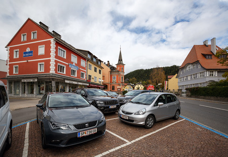 SPITTAL AN DER DRAU, AUSTRIA - OCTOBER 8, 2017. Car parking in the old town square. Town of Spittal an der Drau, Gurktal Alps (Nock Mountains), federal state of Carinthia, Austria.のeditorial素材