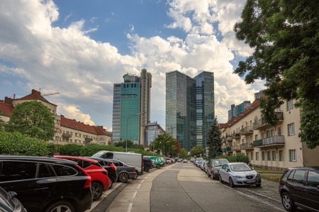 VIENNA, AUSTRIA - JULY 10, 2017. Street leading to the skyscrapers of the Winerberg City. District Favoriten, city of Vienna, Austriaのeditorial素材