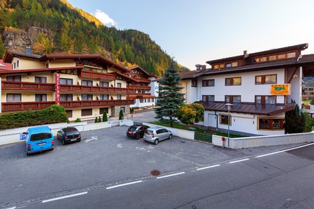 SOELDEN, AUSTRIA - OCTOBER 17, 2018. Traditional hotels overlooking the Alps. Town of Soelden in the Oetztal valley, Tyrol, Austria.のeditorial素材