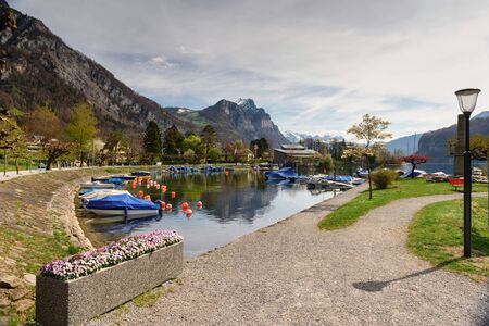 View of the Walensee lake on a sunny spring day. Village of Weesen, See-Gaster, canton of St. Gallen, Switzerland.の写真素材