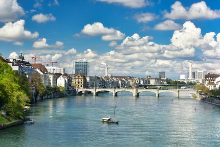 BASEL, SWITZERLAND - APRIL 17, 2019. Ferry line on the Rhine river on a sunny spring day. View of...