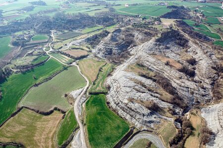 View from hot air balloon at the scenic mountain landscape near town of Vic. Agricultural landscape in spring. Province of Barcelona, Catalonia, Spain.の写真素材