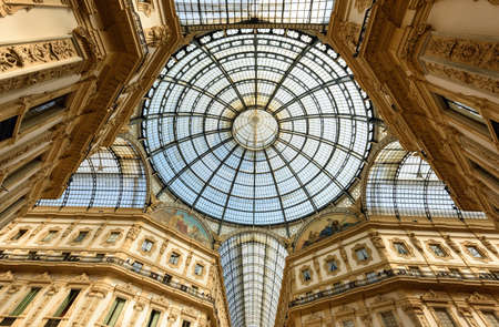 MILAN, ITALY - APRIL 17, 2018. Galleria Vittorio Emanuele II from inside the arcade. View of the glass dome. City of Milan, region of Lombardy, Italy, Europe.のeditorial素材