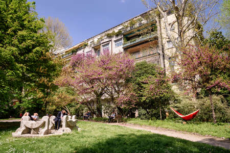 MILAN, ITALY - APRIL 17, 2018. Small cozy park Giardini Perego in front of residential building in the center of Milan, region of Lombardy, Italy, Europe.のeditorial素材