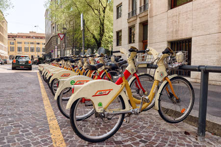MILAN, ITALY - APRIL 17, 2018. Bike docking station on the Sant Erasmo Square. Bike sharing service. City of Milan, region of Lombardy, Italy, Europe.のeditorial素材