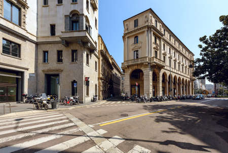 MILAN, ITALY - APRIL 17, 2018. Historical buildings in the old town as viewed from the street of Largo Raffaele Mattioli. City of Milan, region of Lombardy, Italy, Europe.のeditorial素材
