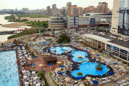 KAZAN, RUSSIA - AUGUST 06, 2020. Outdoor swimming pools of the Riviera entertainment complex at the banks of Kazanka river. Aerial view of the water park. City of Kazan, Republic of Tatarstan, Russia.のeditorial素材