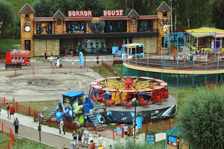 KAZAN, RUSSIA - AUGUST 03, 2021. Aerial view of the Kyrlai amusement park. View of the Horror House and Galaxy attraction. City of Kazan, Republic of Tatarstan, Russian Federation.のeditorial素材
