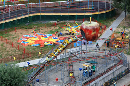KAZAN, RUSSIA - AUGUST 03, 2021. Kyrlai amusement park from above. View of the Merry Caterpillar attraction. City of Kazan, Republic of Tatarstan, Russian Federation.のeditorial素材