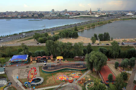 KAZAN, RUSSIA - AUGUST 03, 2021. Skyline of Kazan. View of the Kyrlai amusement park, bridge over Kazanka river and Kremlin. City of Kazan, Republic of Tatarstan, Russian Federation.のeditorial素材